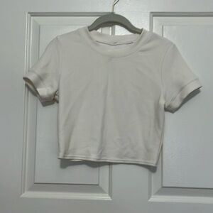 alo cream crop top. Full disclosure, no size or fabric content label. Soft hand